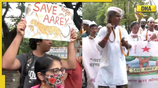 भारी बारिश के बावजूद आरे जंगल में शेड परियोजना के विरोध में जुटे लोग भारी बारिश के बावजूद आरे जंगल में शेड परियोजना के विरोध में जुटे लोग